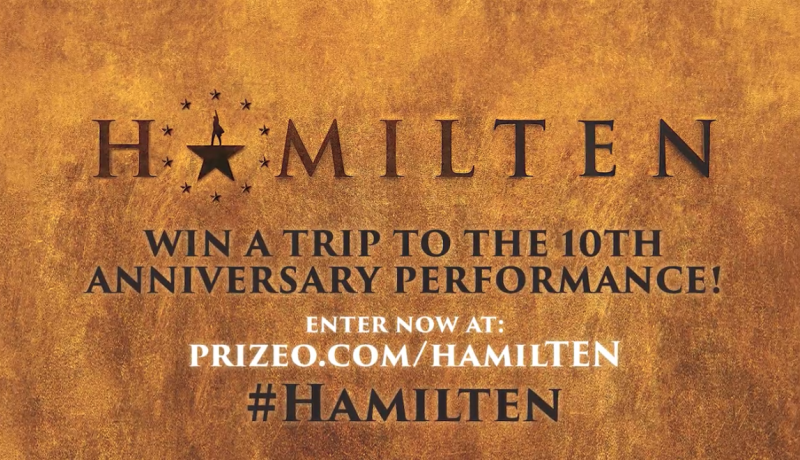 Gold textured background with the word ‘HAMILTEN’ in large bold letters. The ‘A’ in Hamilton is replaced with a star and silhouette of Alexander Hamilton. Below it, text reads: ‘Win a trip to the 10th Anniversary Performance! Enter now at: prizeo.com/hamilten #HamilTEN’.