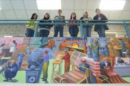Teen Grantmaking Initiative members with a mural